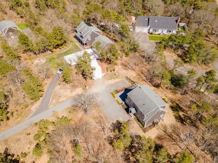 an aerial view of residential house with parking space