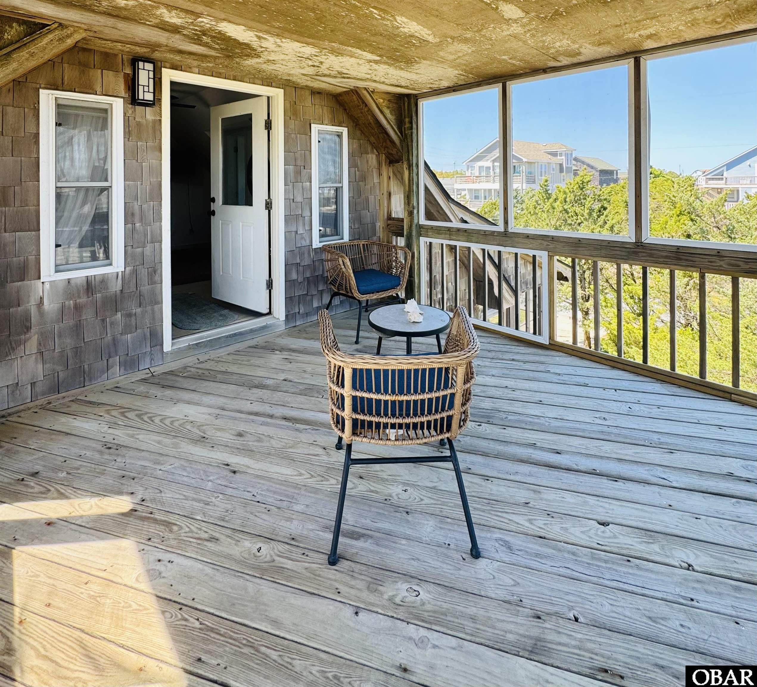 26212 Bluebeard Road Salvo, NC 27982 - Photo 24 of 46 Screen porch off owner's second level.