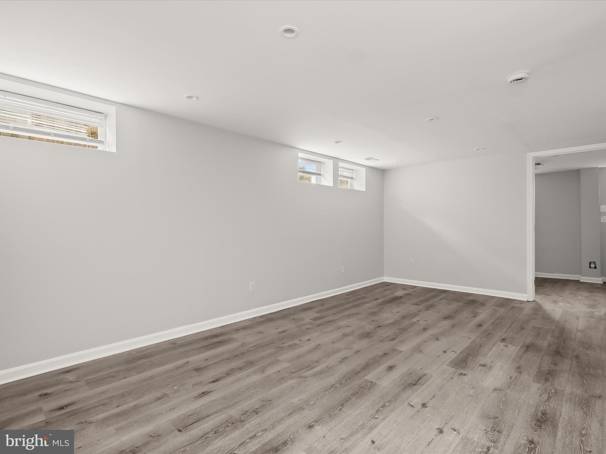 6140 Radecke Avenue Baltimore, MD 21206 - Photo 10 of 25 Lower-level recreation room