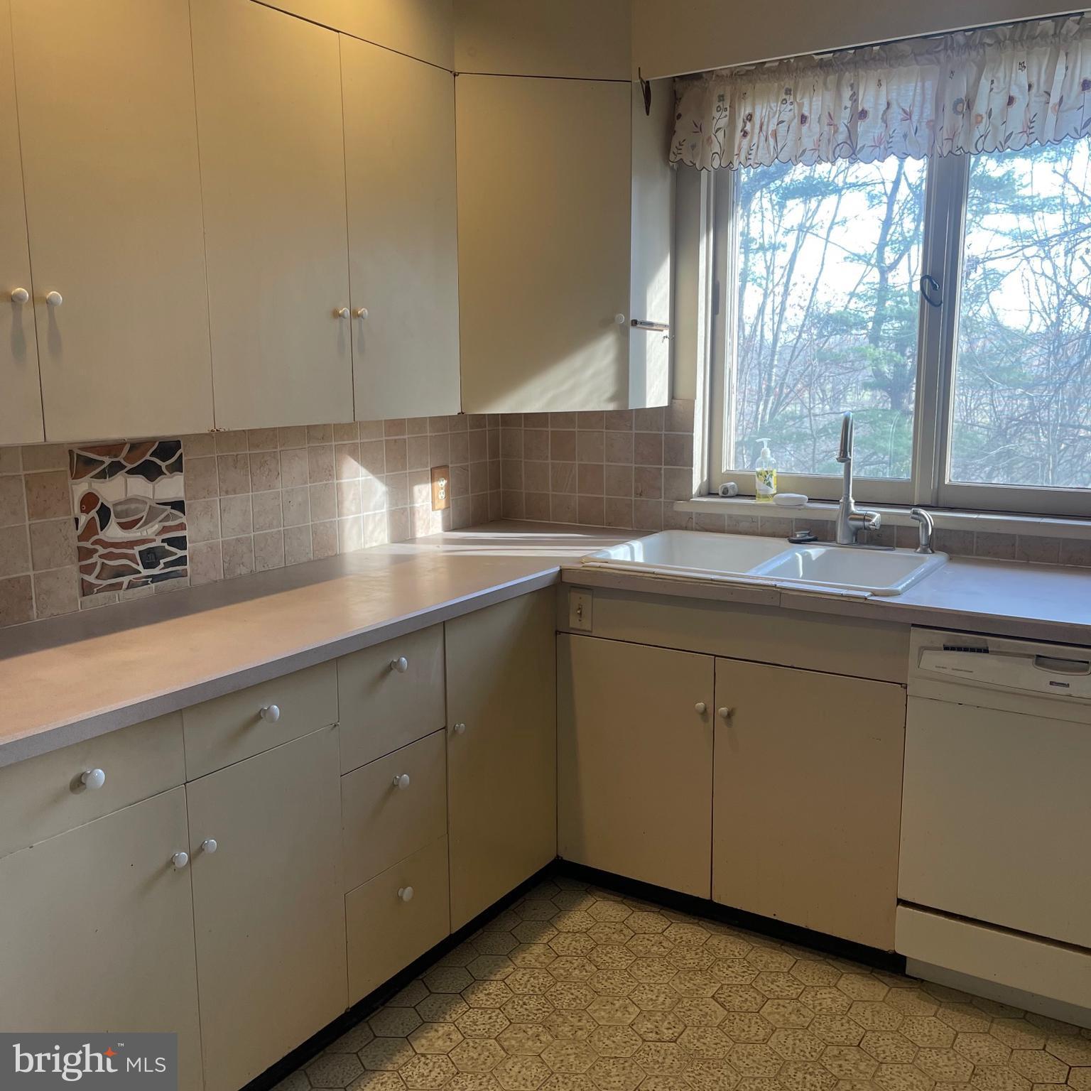 30 Golfview Road Doylestown, PA 18901 - Photo 14 of 23 a kitchen with a sink and cabinets