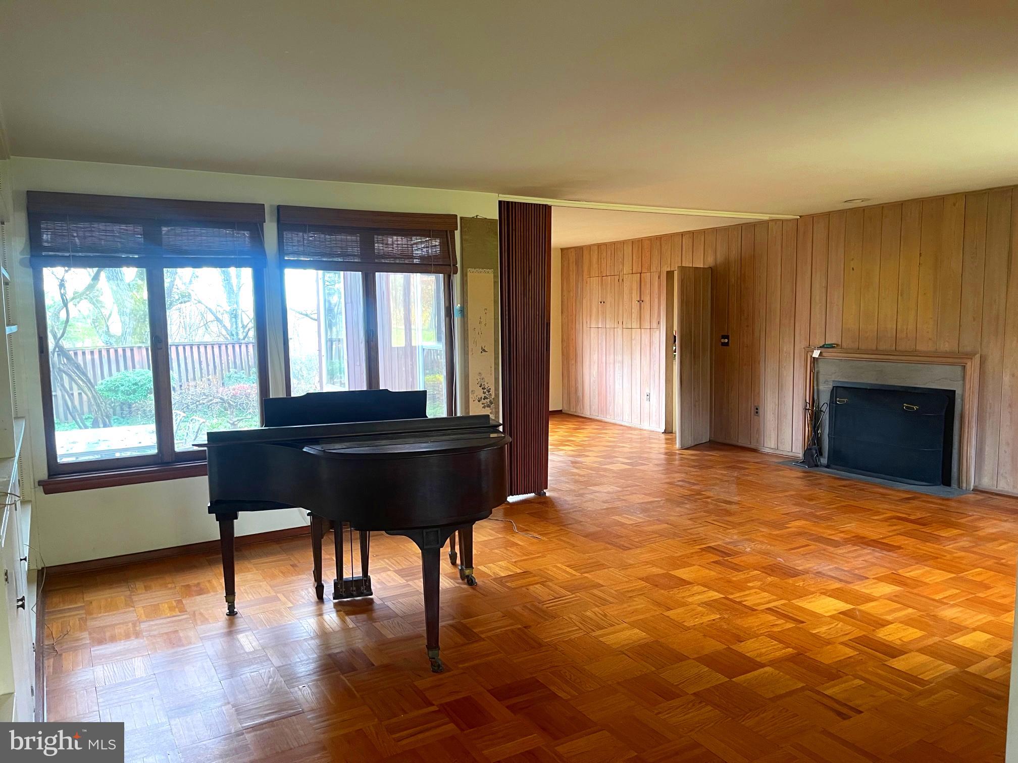 30 Golfview Road Doylestown, PA 18901 - Photo 9 of 23 a living room with a large window and a fireplace