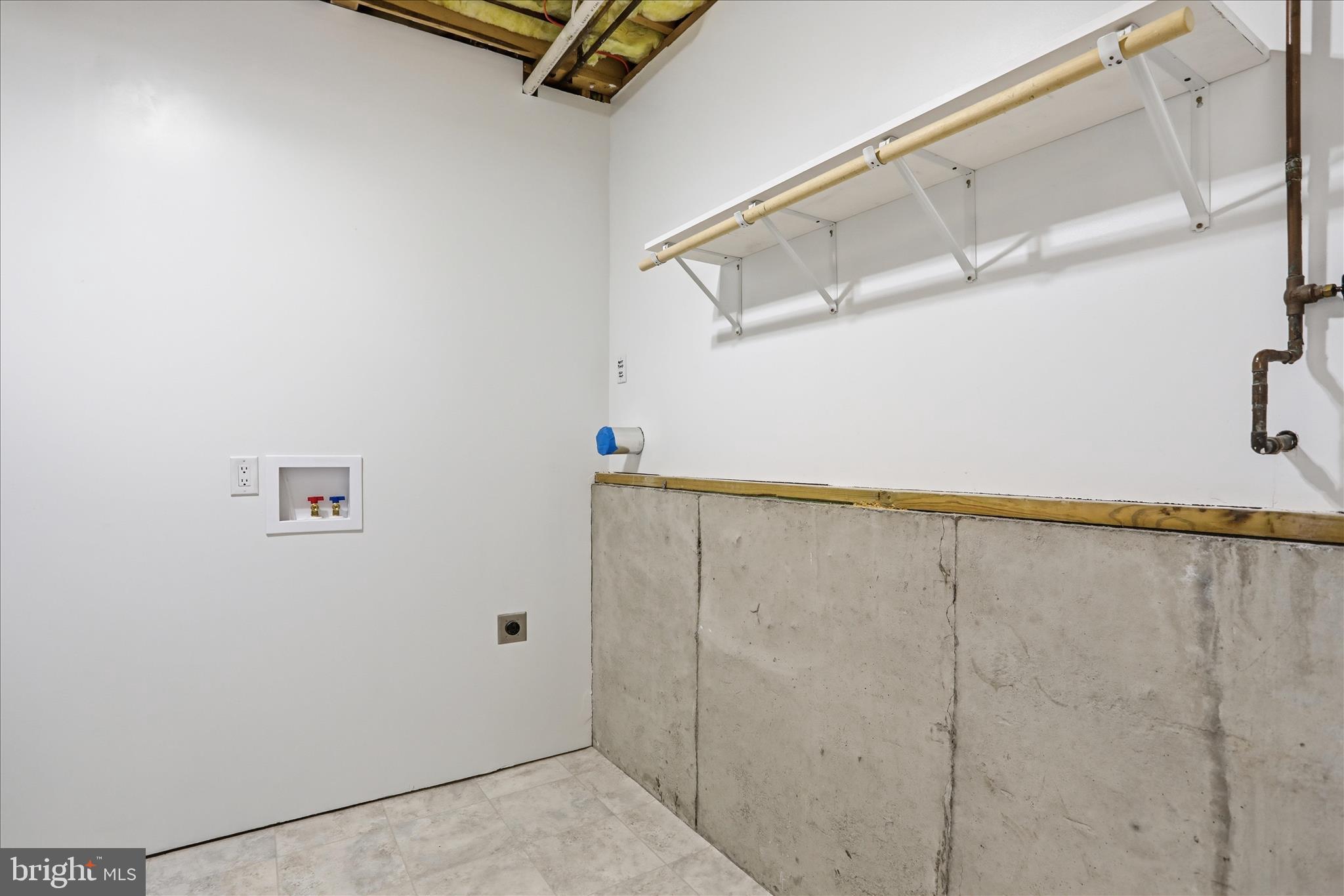 174 Open Field Lane Falling Waters, WV 25419 - Photo 29 of 56 Lower level separate laundry room