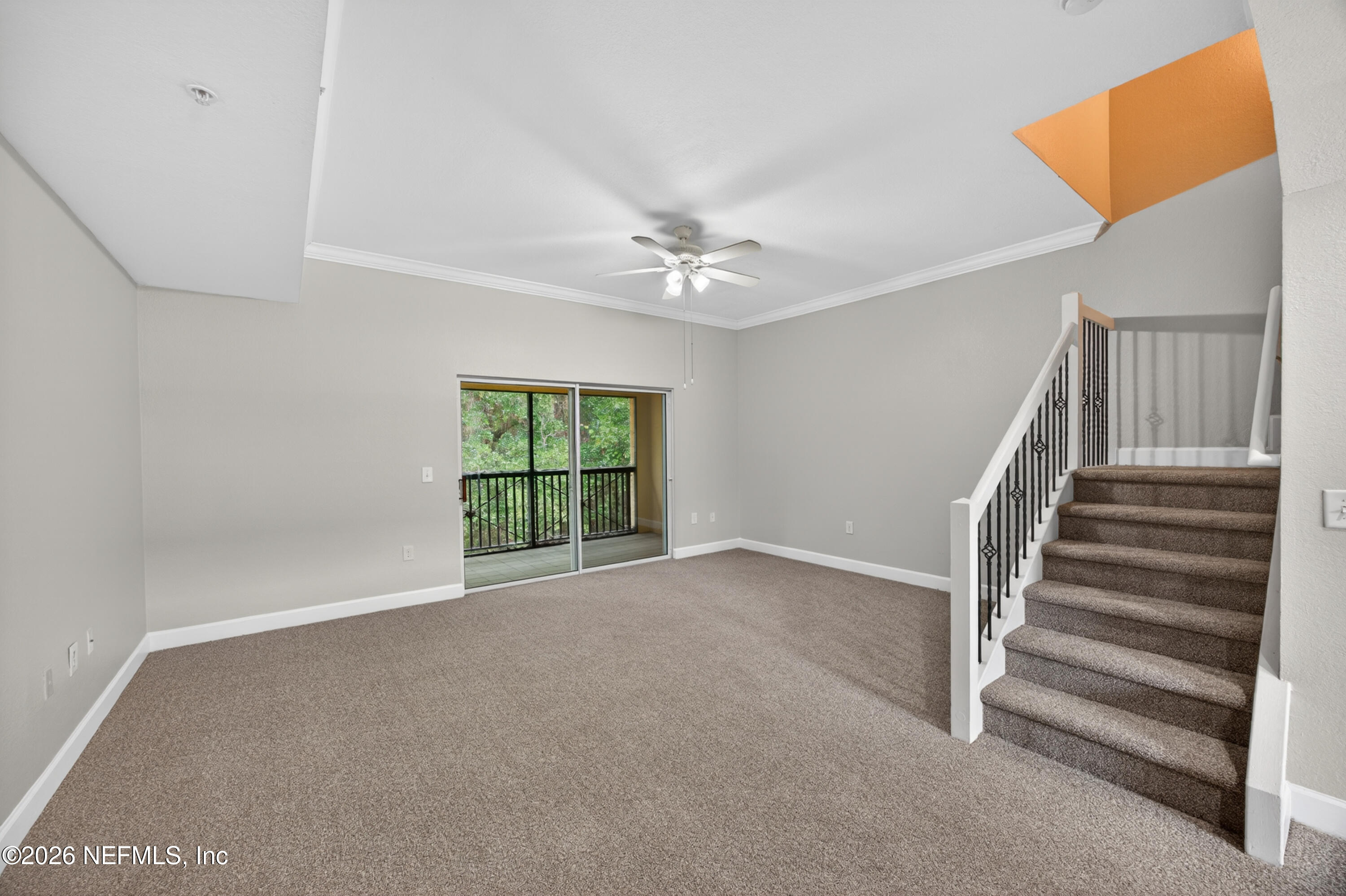9745 Touchton Road, Unit 1224 Jacksonville, FL 32246 - Photo 7 of 22 a view of an empty room with a window