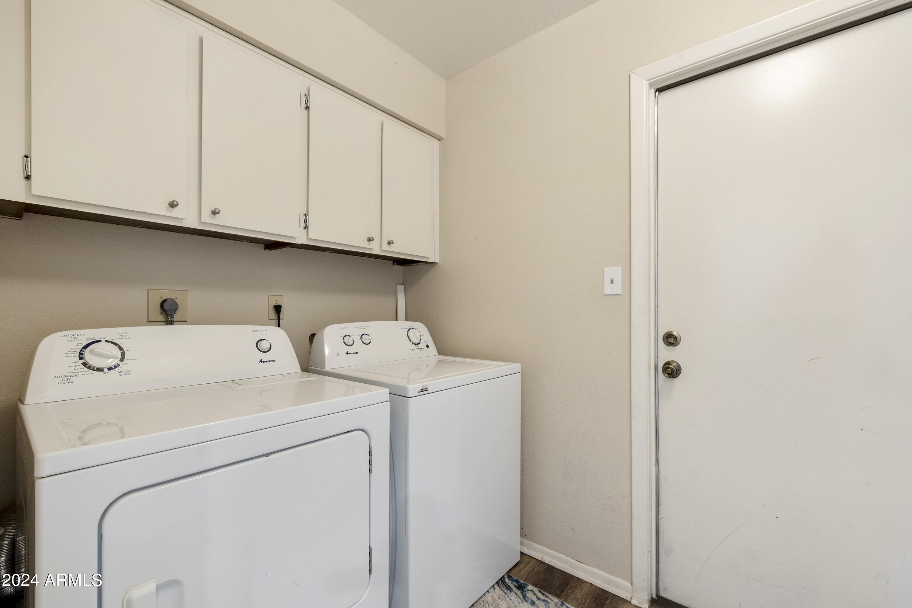 1223 North Granite Reef Road Scottsdale, AZ 85257 - Photo 25 of 35 a view of storage and utility room with washer and dryer