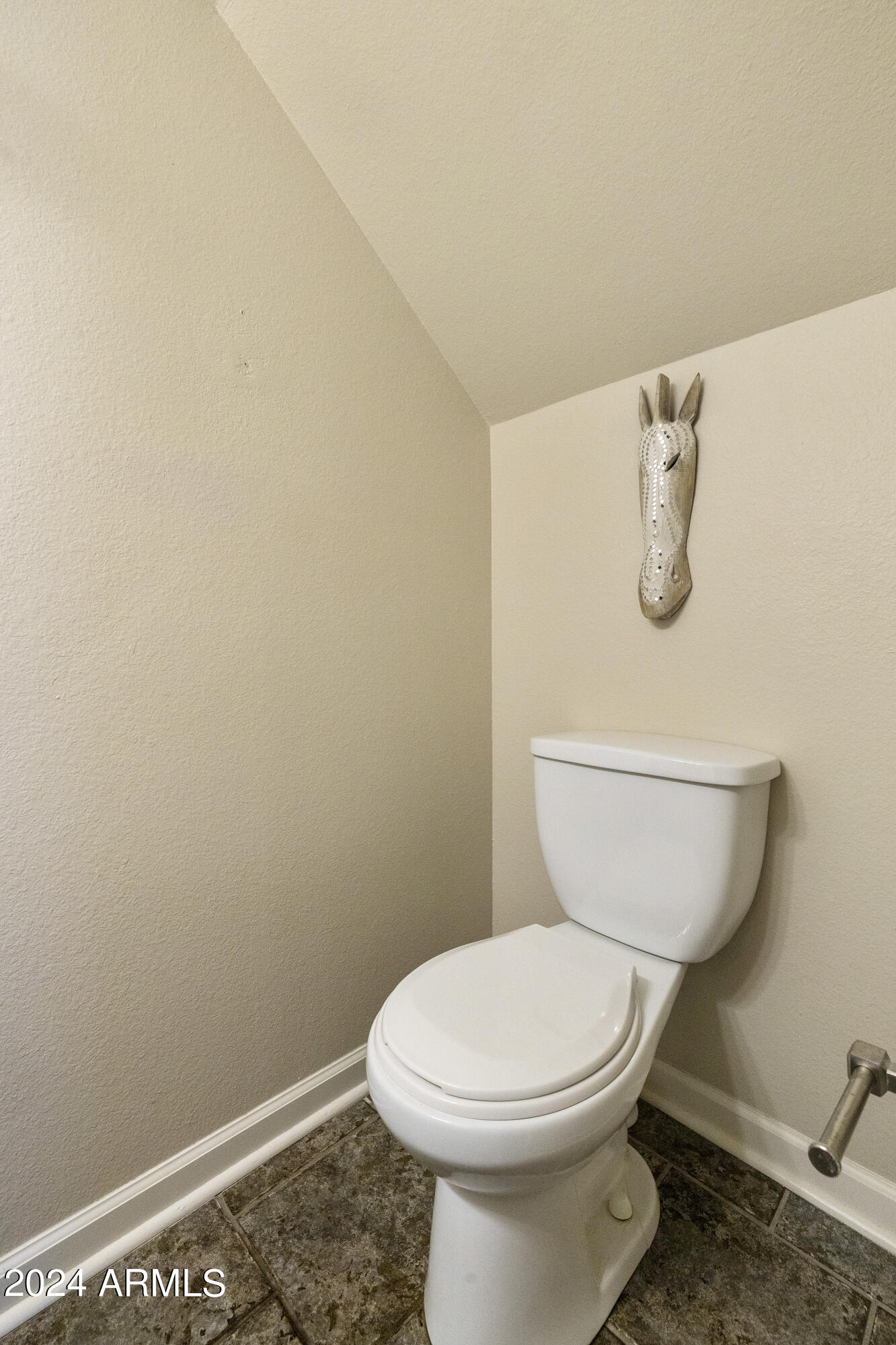 1223 North Granite Reef Road Scottsdale, AZ 85257 - Photo 27 of 35 a bathroom with a toilet and a sink