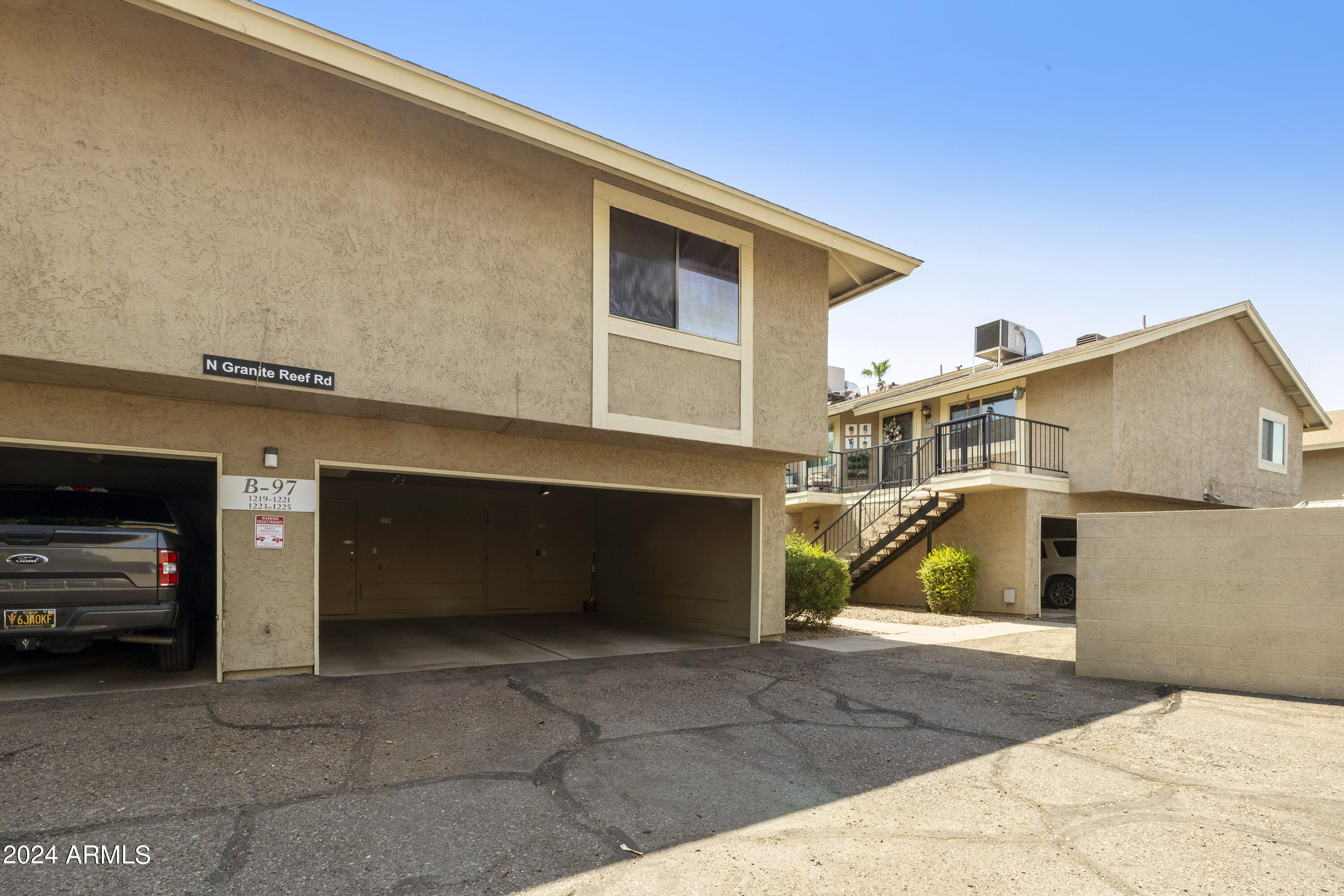 1223 North Granite Reef Road Scottsdale, AZ 85257 - Photo 30 of 35 a view of a car park in front of house