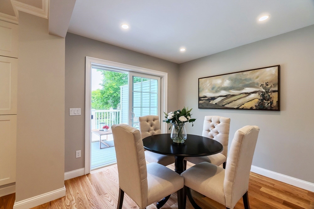 269 Dale Street, Unit 1 Waltham, MA 02451 - Photo 17 of 42 a view of a dining room with furniture window and wooden floor