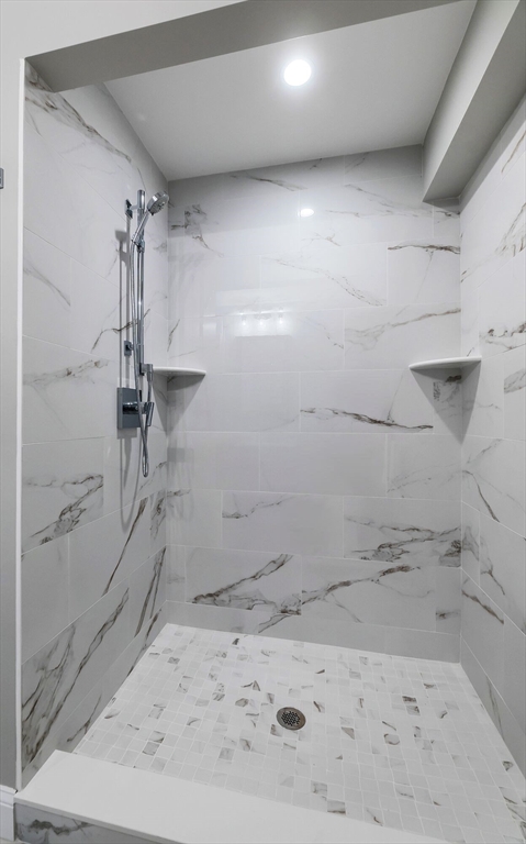 269 Dale Street, Unit 1 Waltham, MA 02451 - Photo 24 of 42 a bathroom with a shower