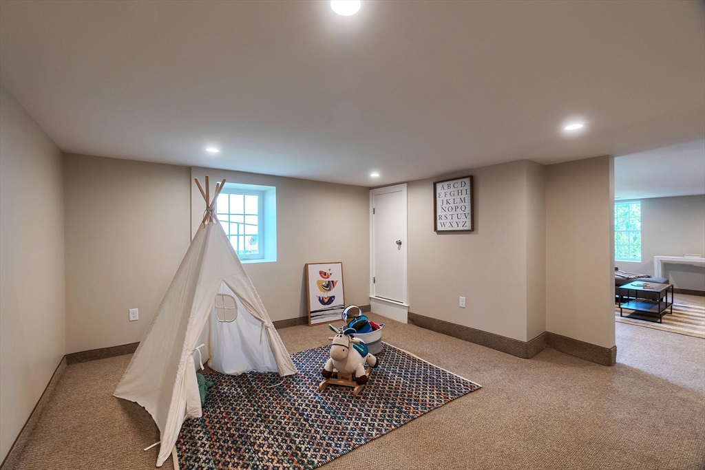 269 Dale Street, Unit 1 Waltham, MA 02451 - Photo 32 of 42 a living room with furniture and a window