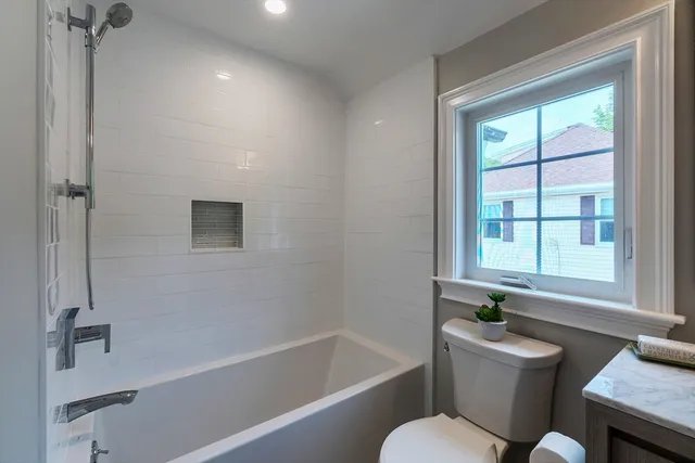a bathroom with a sink and a bathtub