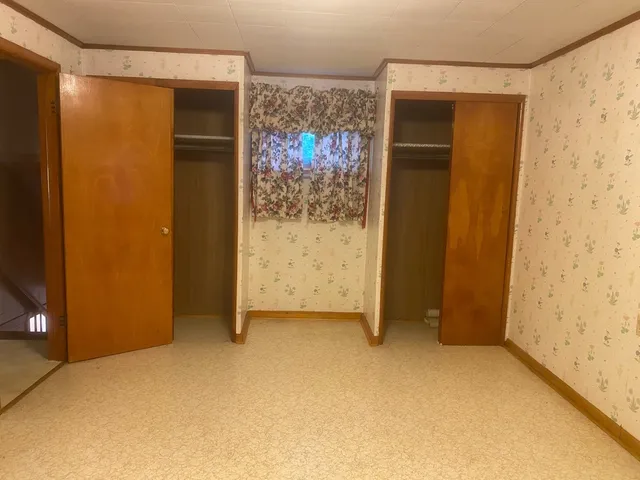 an empty room with a door