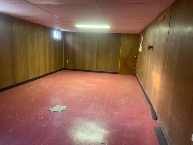 a view of an empty room with a gallery