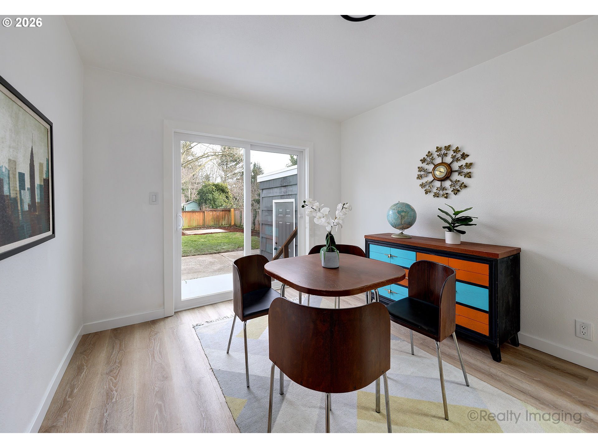 3316 Southeast 36th Avenue Portland, OR 97202 - Photo 6 of 20 a dining room with furniture a rug and wooden floor