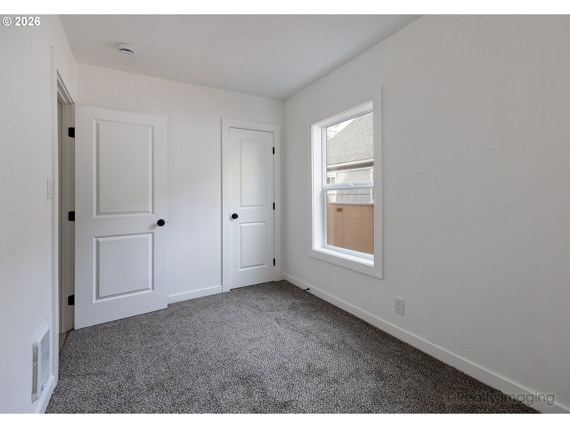 3316 Southeast 36th Avenue Portland, OR 97202 - Photo 9 of 20 a view of an empty room with a window