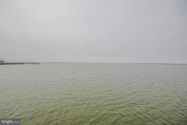 a view of ocean with a deck