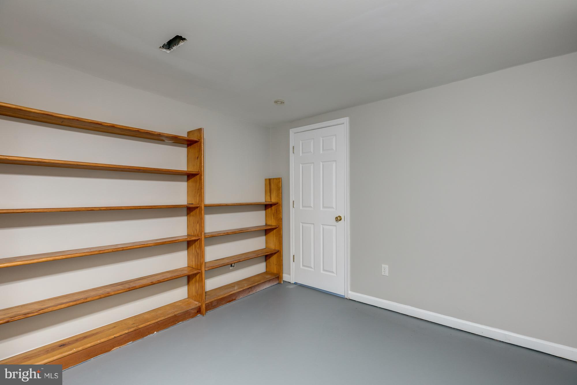 440 Beulah Road Vienna, VA 22180 - Photo 23 of 28 Lower Level Shelving and separate Laundry Room