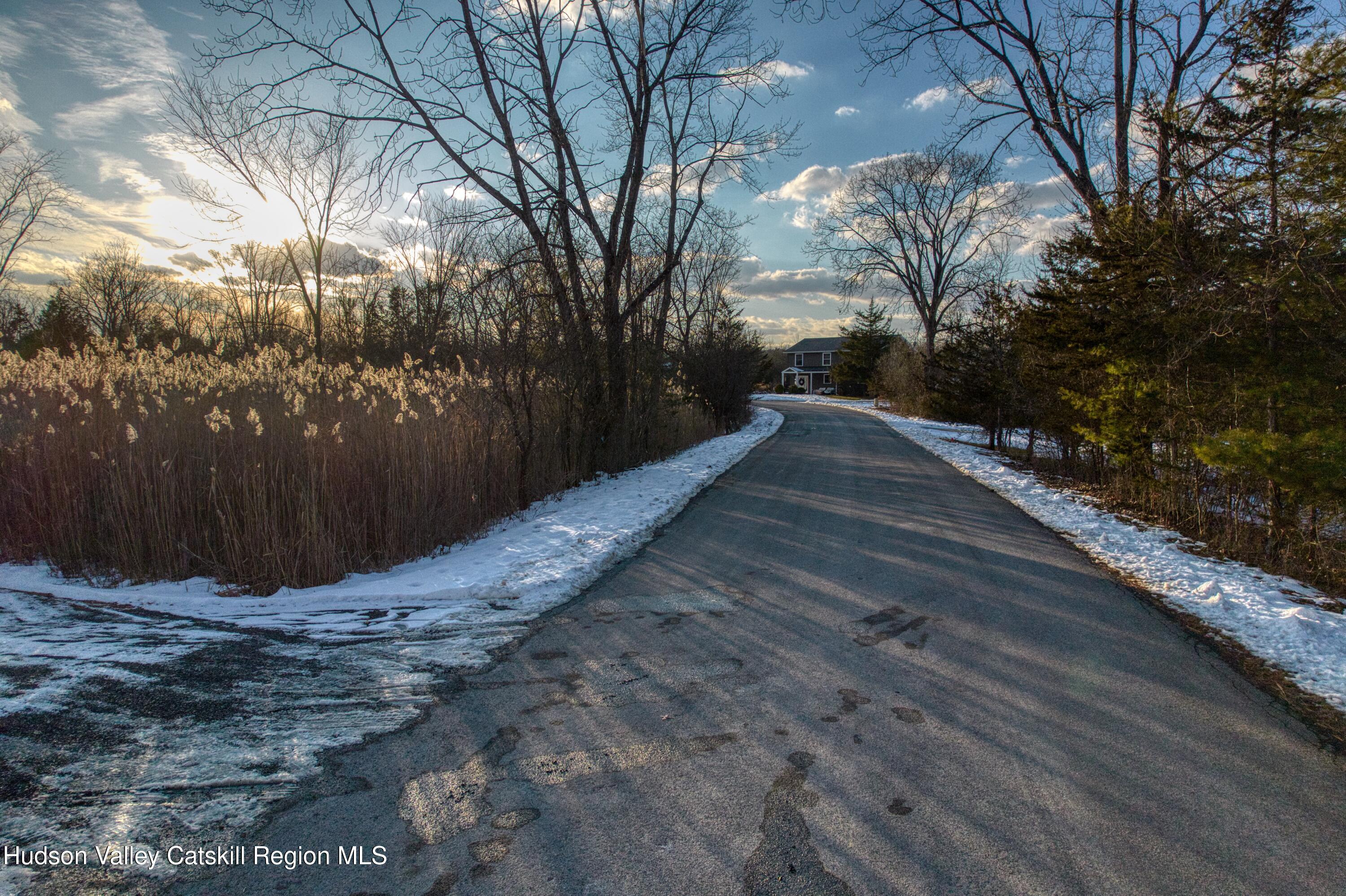 109 Rip Van Winkle Drive Athens, NY 12015 - Photo 10 of 15 a view of a yard with wooden fence