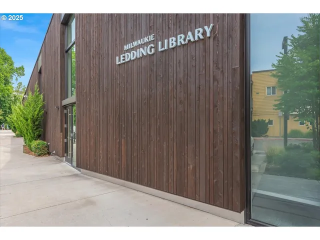 a view of a street with cars