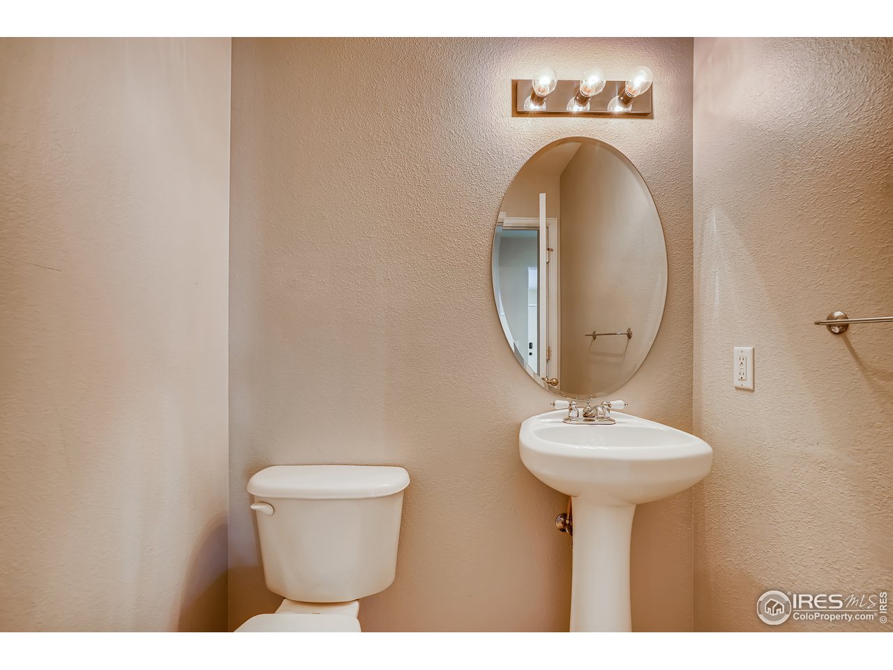 2702 Rigden Parkway, Unit A3 Fort Collins, CO 80525 - Photo 12 of 33 a bathroom with a sink and a mirror
