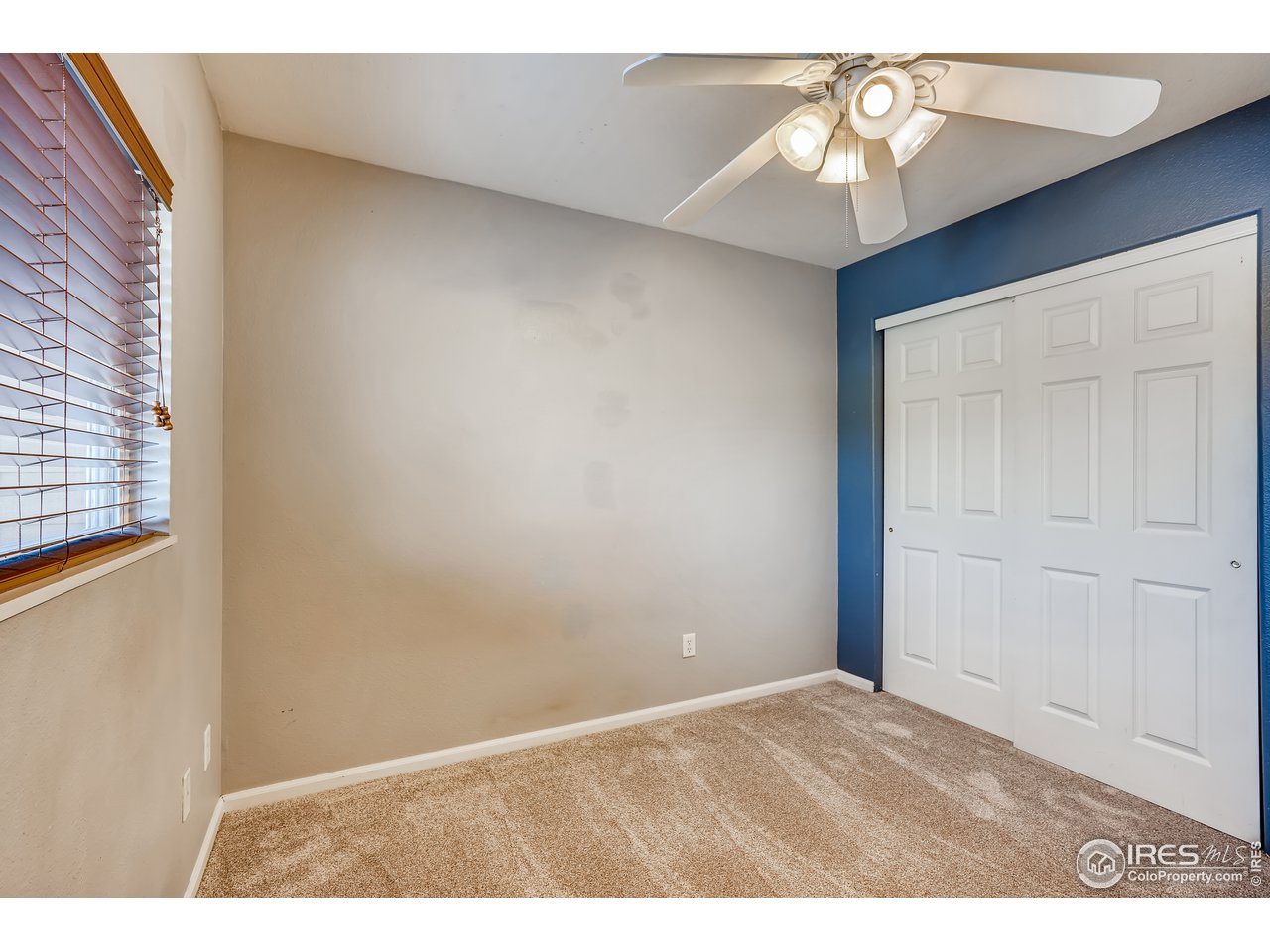 2702 Rigden Parkway, Unit A3 Fort Collins, CO 80525 - Photo 20 of 33 a view of an empty room and window
