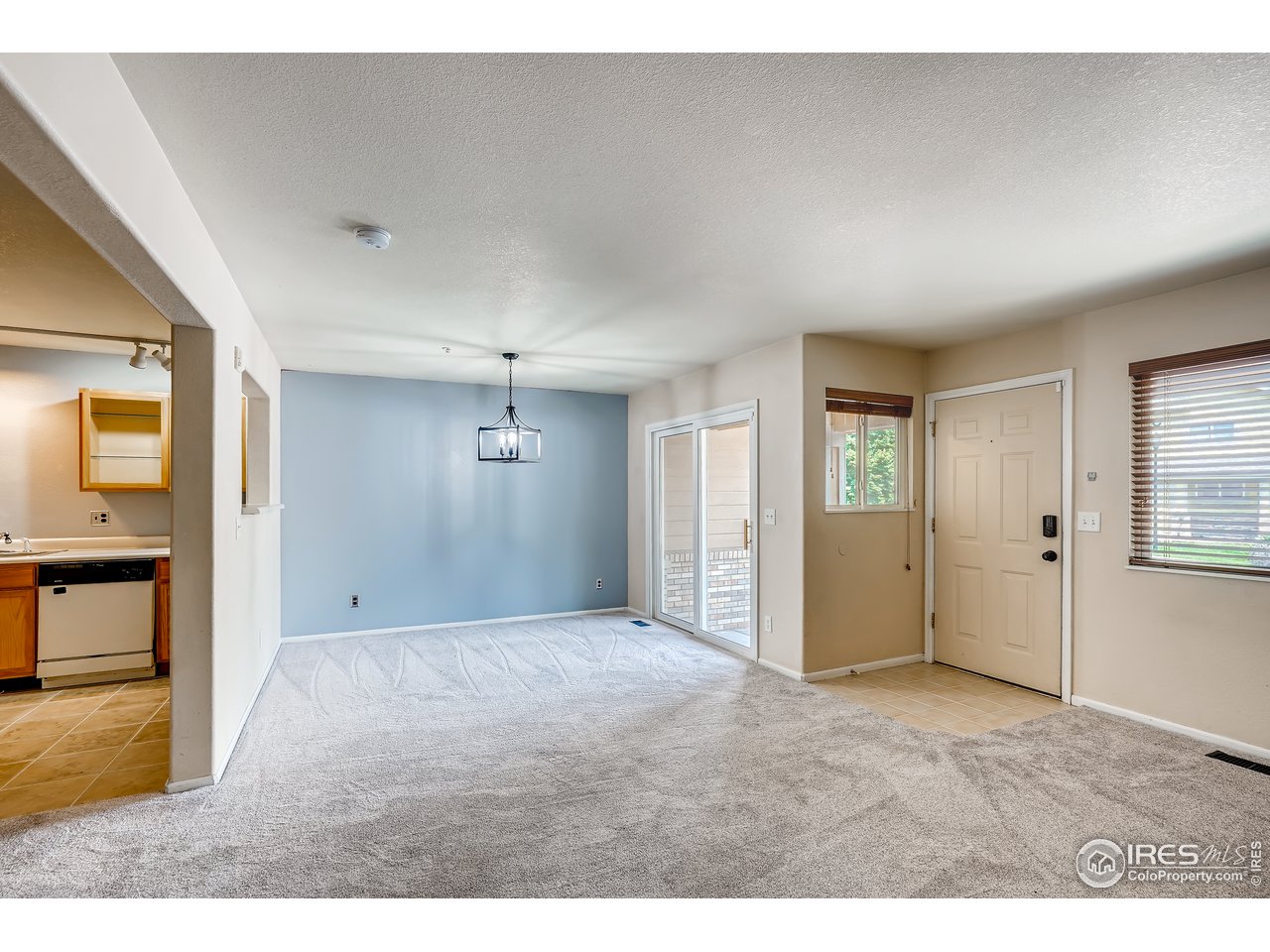 2702 Rigden Parkway, Unit A3 Fort Collins, CO 80525 - Photo 5 of 33 a view of an empty room with a window