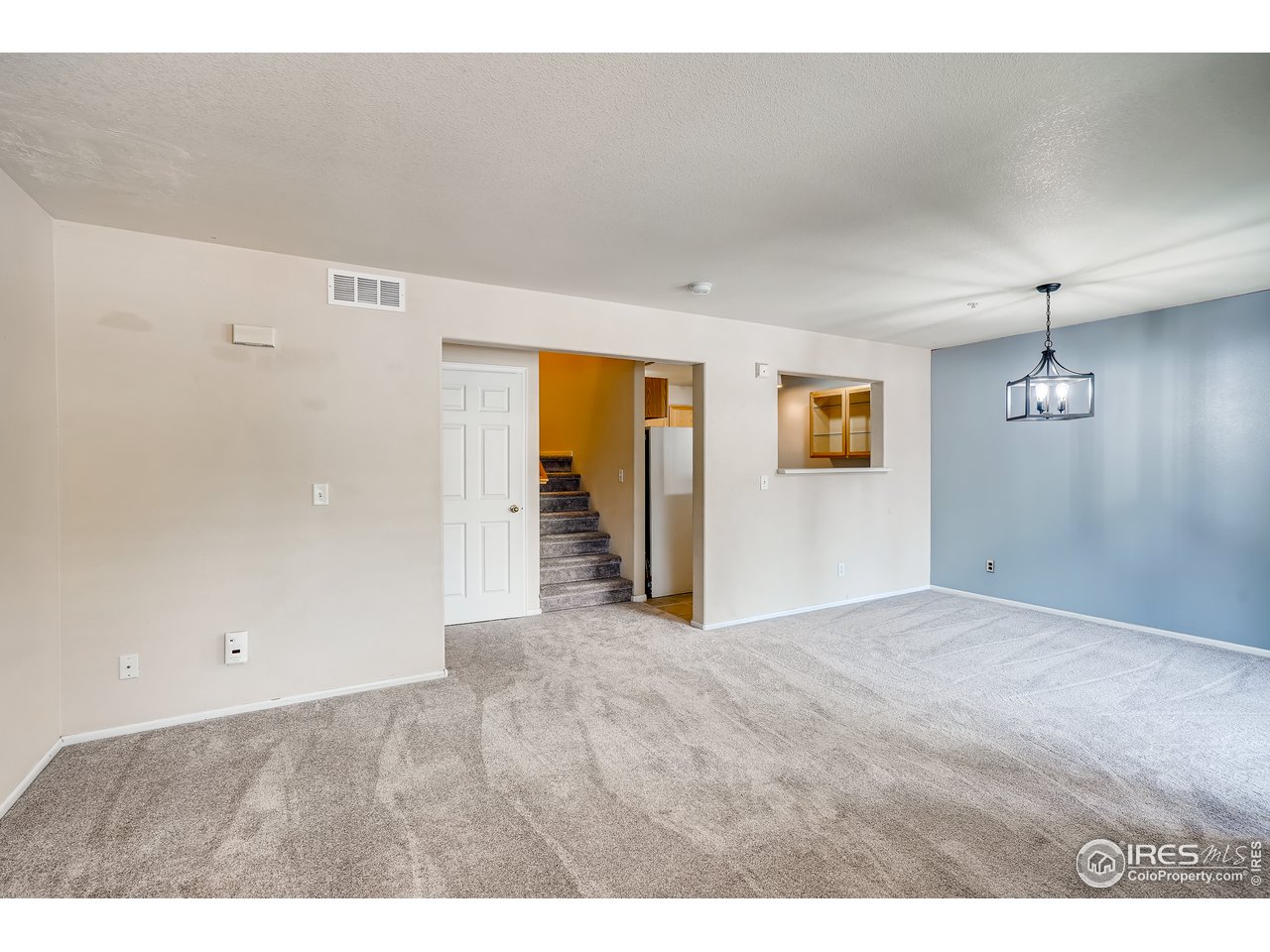2702 Rigden Parkway, Unit A3 Fort Collins, CO 80525 - Photo 6 of 33 a view of an empty room