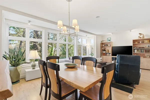 a view of a dining room with furniture window and outside view