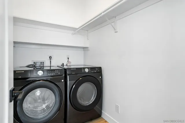 a utility room with dryer and washer