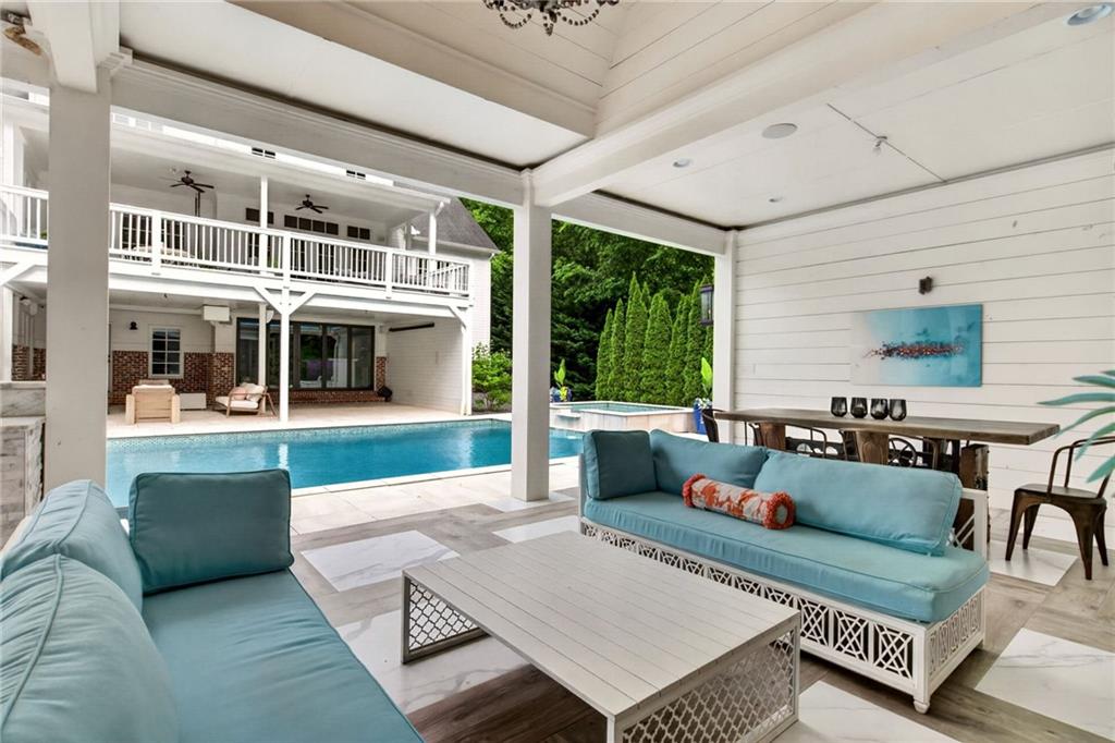 13460 New Providence Road Milton, GA 30004 - Photo 50 of 60 a outdoor living space with furniture and garden view
