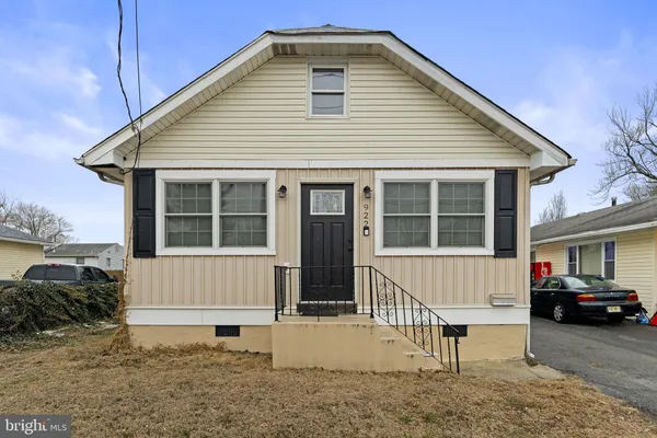 a front view of a house with a patio