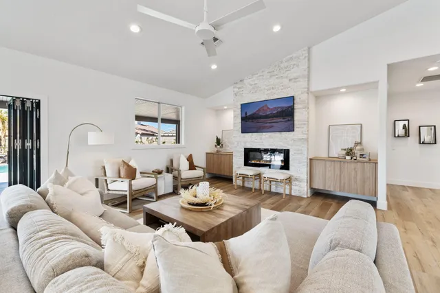 a white stove top oven sitting inside of a kitchen