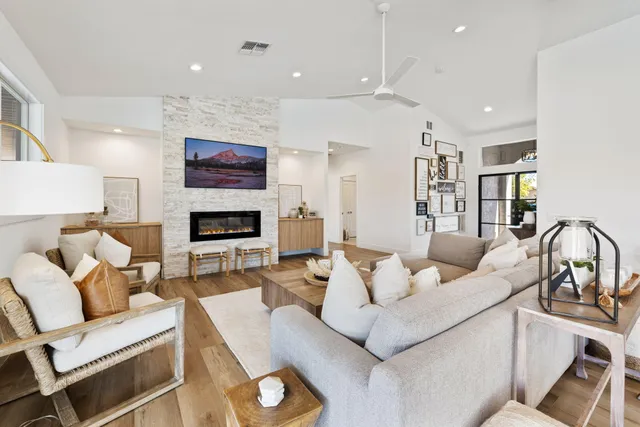 a kitchen with a table chairs stove and microwave