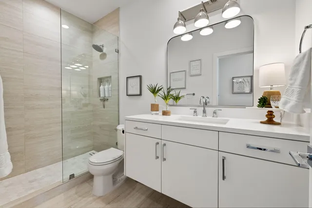a view of a patio with a table and chairs