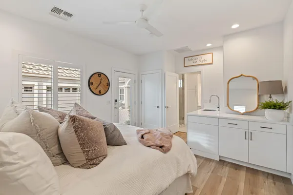 a view of a swimming pool with a table and chairs