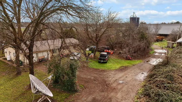 a view of a back yard of the house