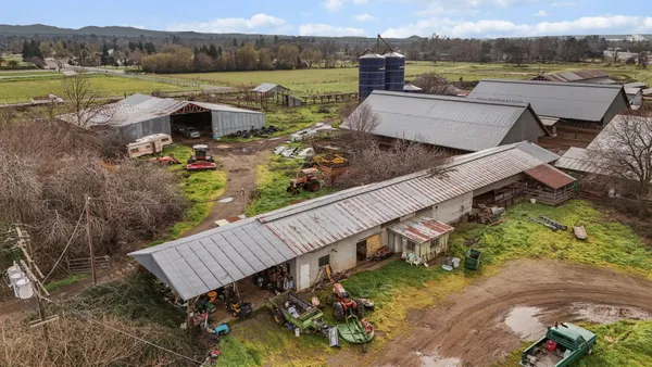 a view of a wooden deck and lake view