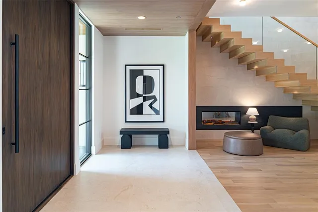 a view of a living room with a couch and chandelier