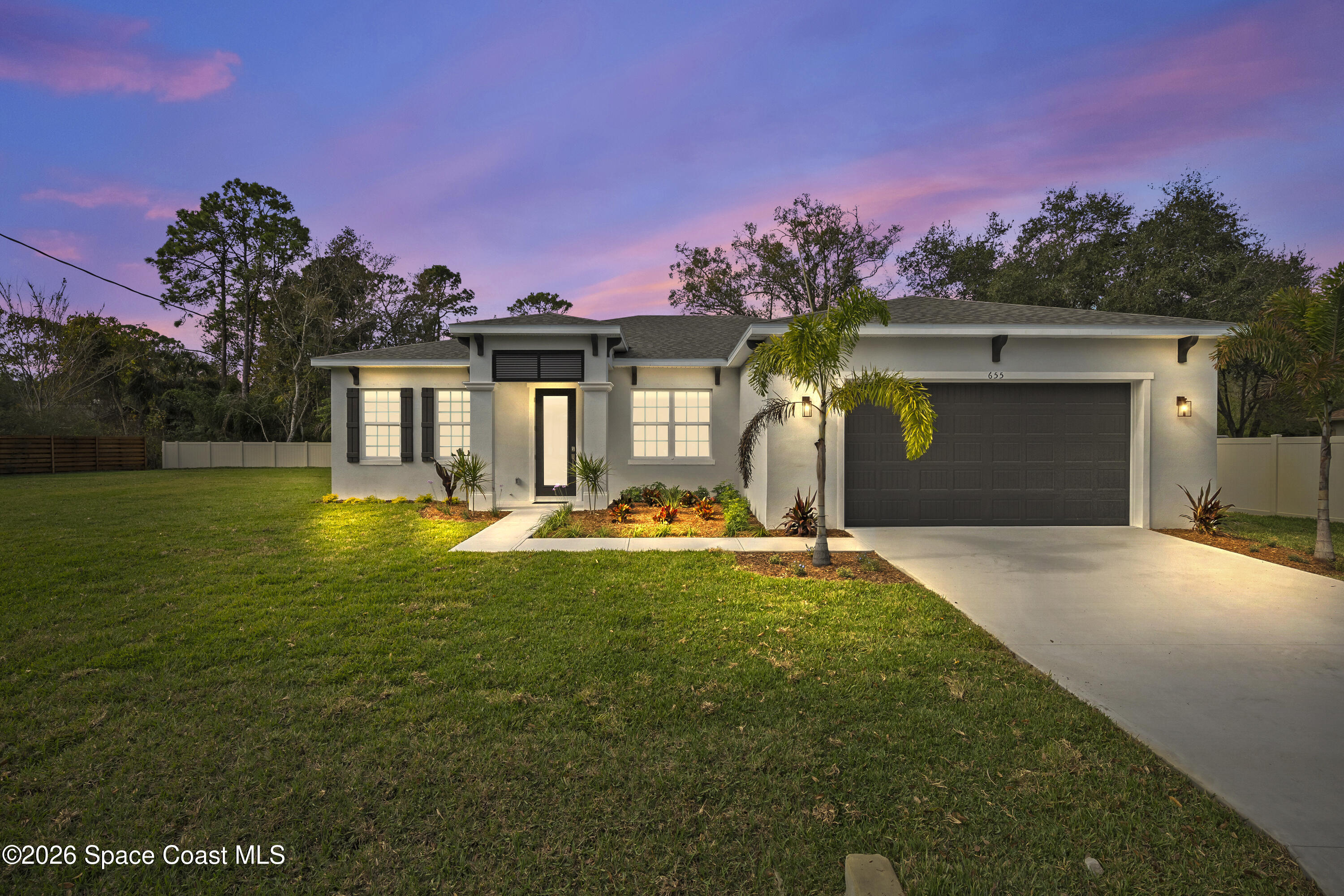 655 Vine Street Melbourne, FL 32904 - Photo 1 of 33 a view of a house with a yard and a yard