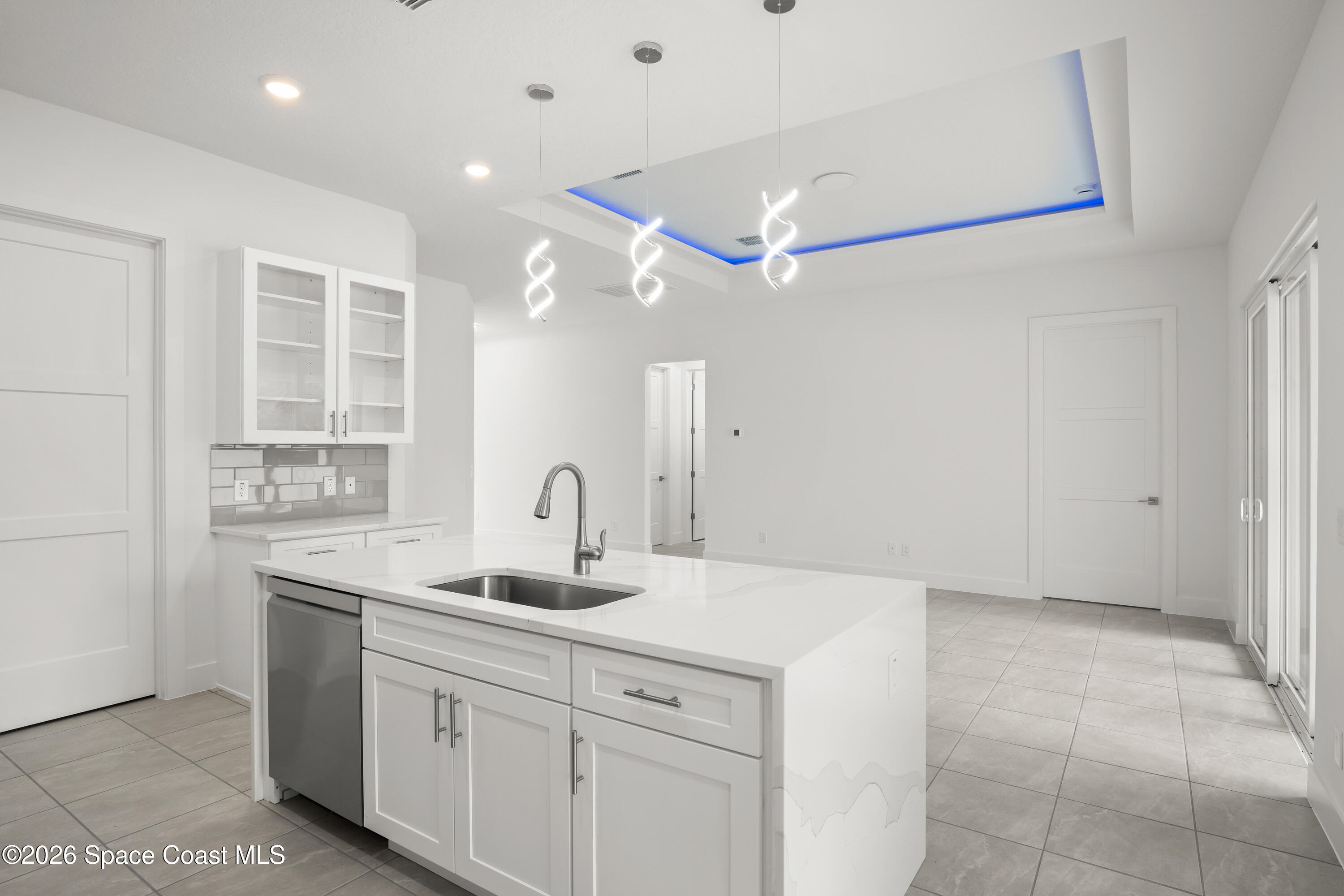 655 Vine Street Melbourne, FL 32904 - Photo 15 of 33 a bathroom with a sink and a mirror