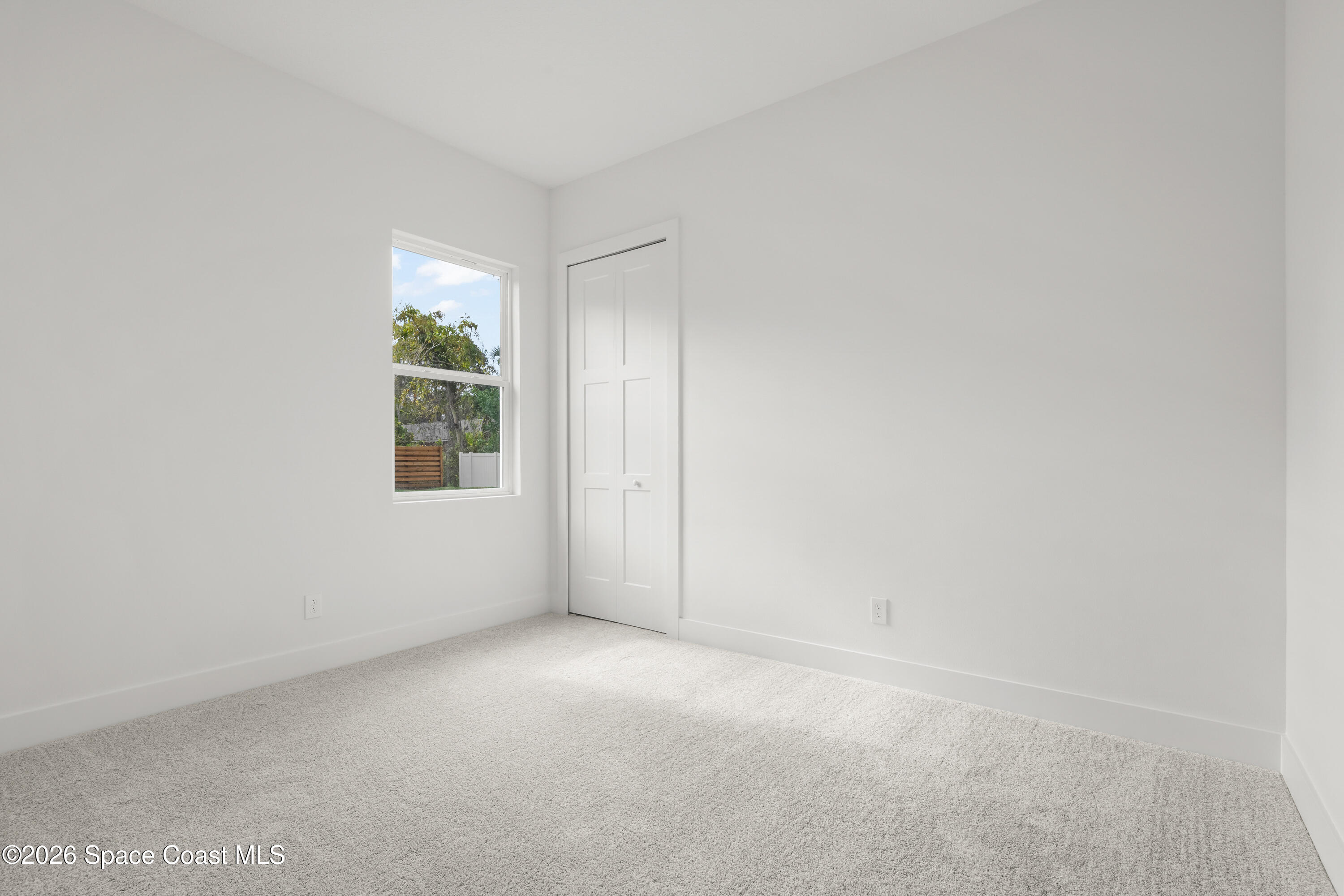 655 Vine Street Melbourne, FL 32904 - Photo 25 of 33 an empty room with windows