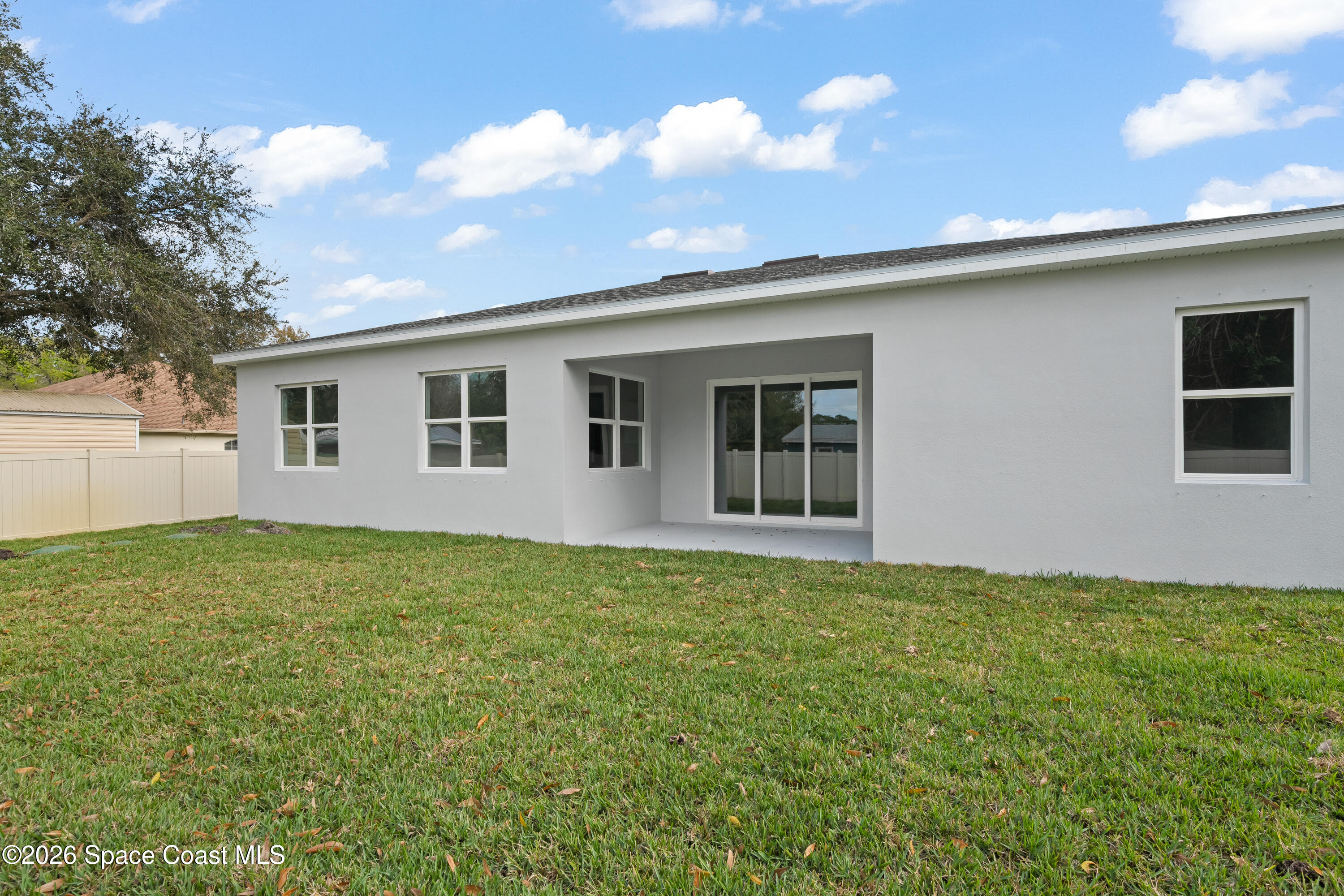655 Vine Street Melbourne, FL 32904 - Photo 30 of 33 a house view with a garden space
