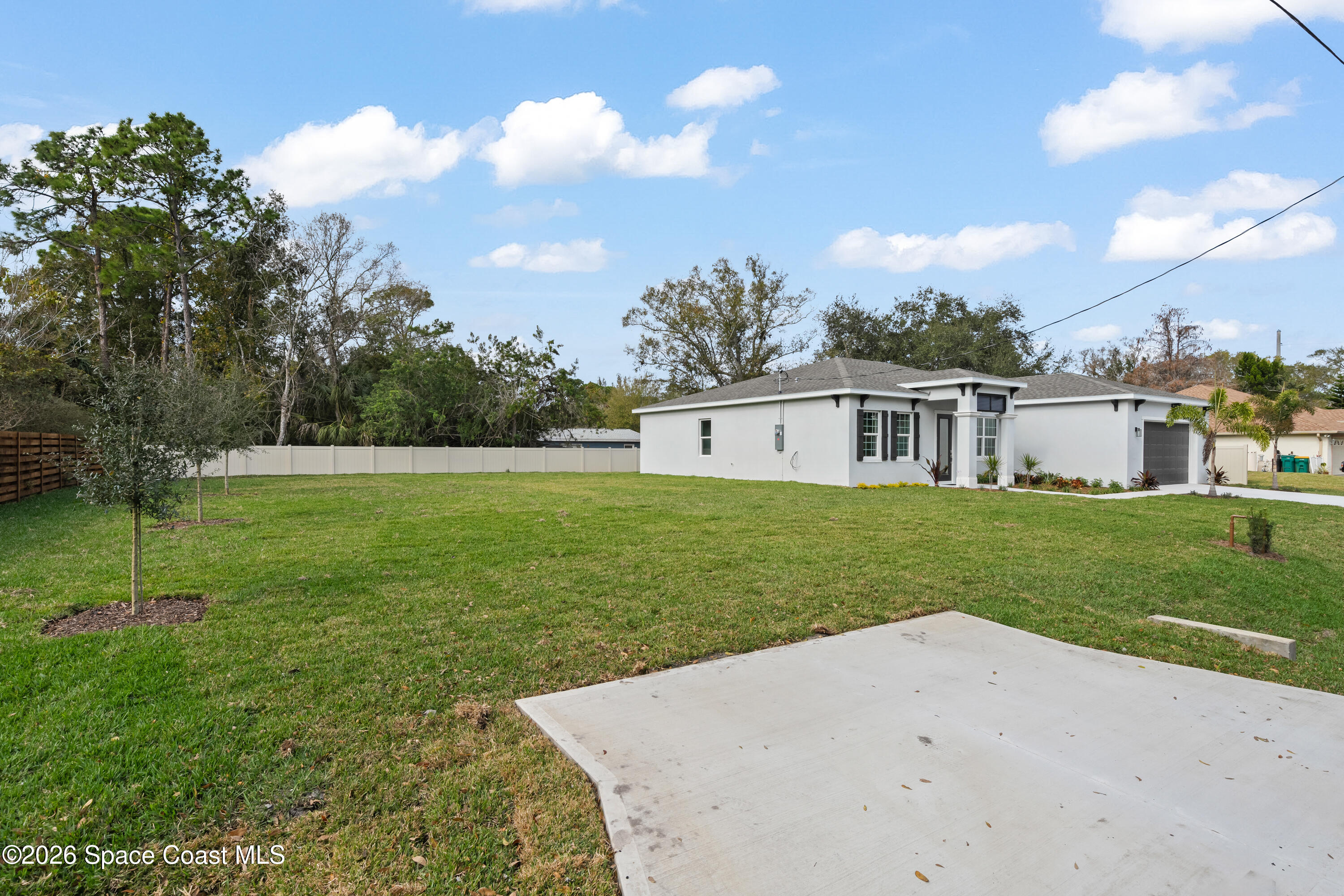 655 Vine Street Melbourne, FL 32904 - Photo 31 of 33 a view of a house with a yard