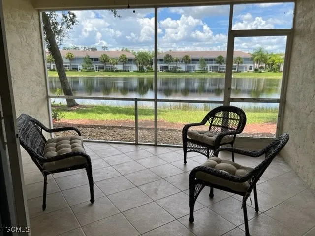a view of a lake and outdoor seating