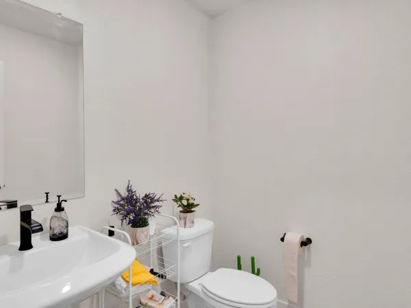 a bathroom with a sink and a toilet