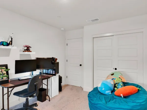 a workspace with furniture and window