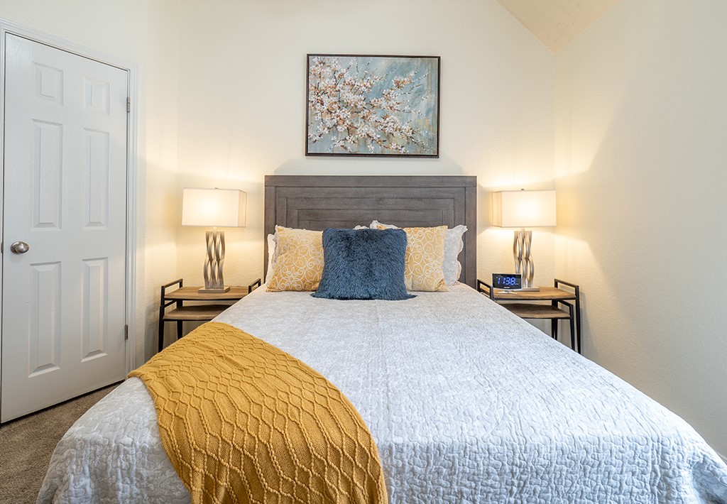 8007 Isaac Pryor Drive Austin, TX 78749 - Photo 28 of 38 a bedroom with a bed and a night stand