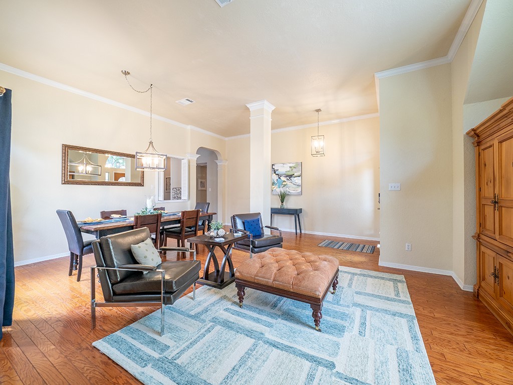 8007 Isaac Pryor Drive Austin, TX 78749 - Photo 3 of 38 a living room with furniture and wooden floor