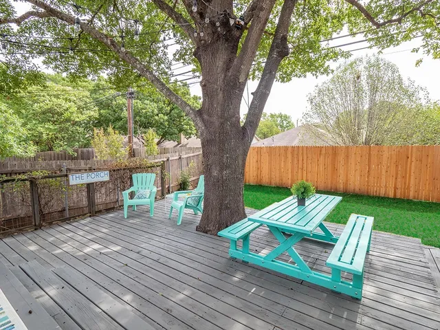 a view of a chairs on the roof deck