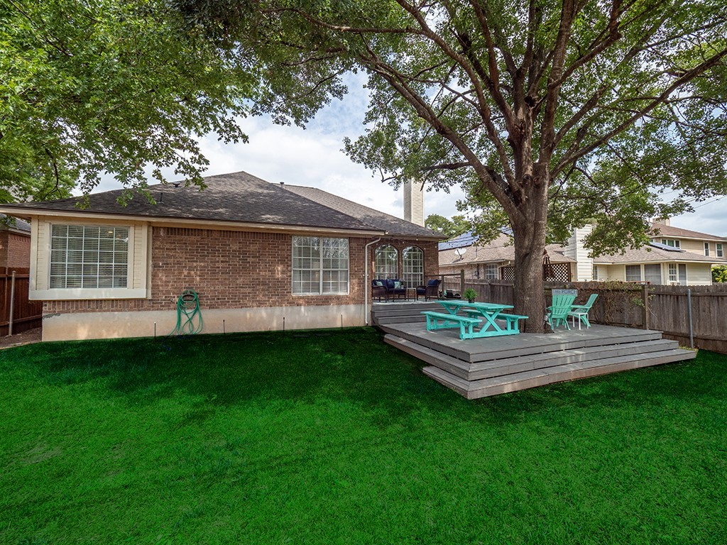 8007 Isaac Pryor Drive Austin, TX 78749 - Photo 37 of 38 a front view of a house with a garden