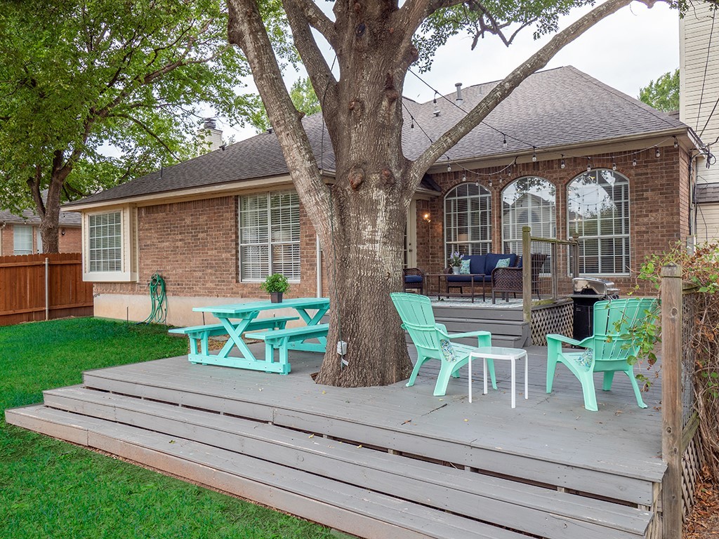 8007 Isaac Pryor Drive Austin, TX 78749 - Photo 38 of 38 a view of a house with backyard sitting area and garden